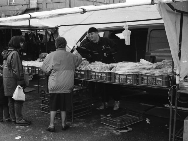 A sale is made at the Foyle Street market.