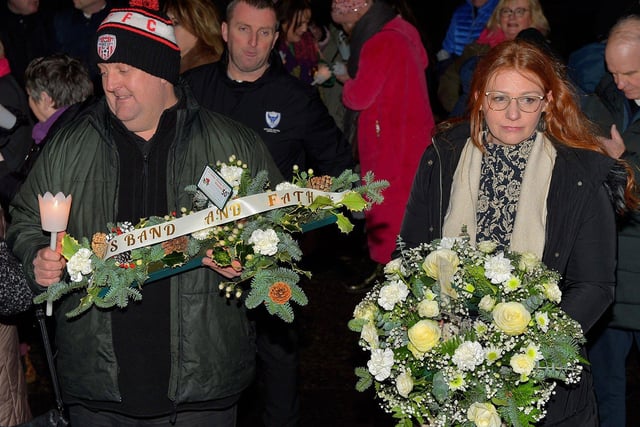 Relatives gather at Strabane Old Road on Tuesday evening for a wreath laying event marking the 50th Anniversary of the Annie’s Bar massacre. Photo: George Sweeney. DER2251GS – 14