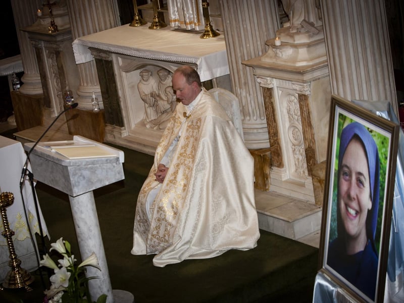 Fr. Gerard Mongan takes a quiet minute during Monday’s Sister Clare Retreat.