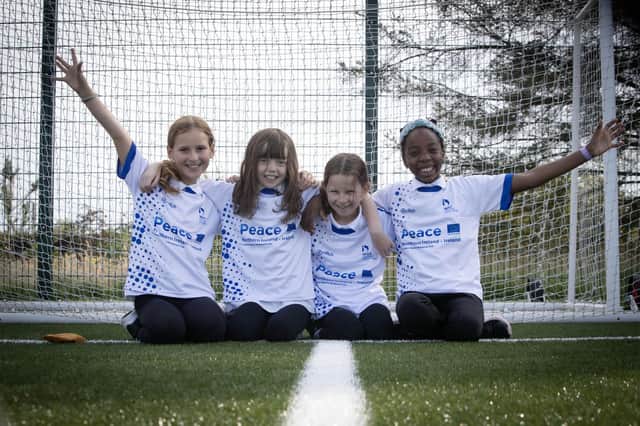 SHARED FUTURE. . . .Enjoying the sporting activities at the Waterside Shared Village pitches on Thursday afternoon during the DCSDC's 'Games of Three Halves - Small Ball' event, are Anna Brown, Sophia D'Hulst, Evie Hughes and Danielle Ojenolin. (Photos: Jim McCafferty Photography)