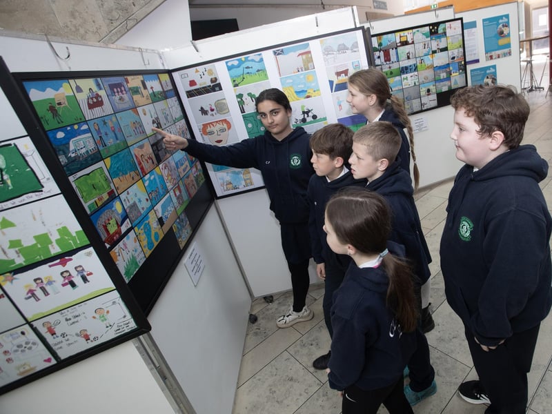 Pupils from St. Patrick's PS, Pennyburn check out some of their artwork at the Annual DEEDS 'My Perfect Day – Our Perfect Day Exhibition' at the Millennium Forum, Derry on Wednesday afternoon.