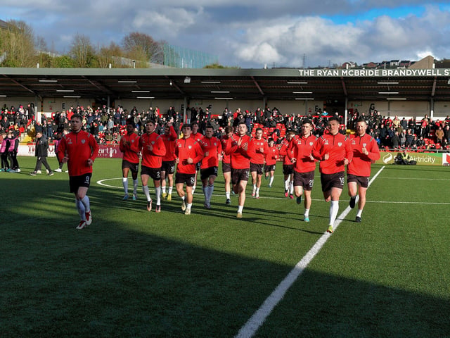 Derry City players return to the changing rooms after a pre-match warm-up, at the Brandywell, on Monday evening. Photo: George Sweeney. DER2315GS – 116