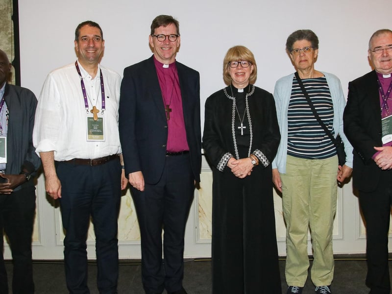 Bishop of Derry and Raphoe, the Rt Rev Andrew Forster with the new Archbishop of Canterbury the Most Revd and Rt Hon Dame Sarah Mullally DBE. Included from left are Bishop Anthony Poggo, secretary general of Anglian Communion Office, Archbishop Hosam Naoum, Palestinian Anglian Bishop, and from right,  John McDowell, Church of Ireland Archbishop of Armagh, Primate of All Ireland, and Canon Maggie Swinson, chair, ACC.(Photo - Deirdre Heaney, nwpresspics)