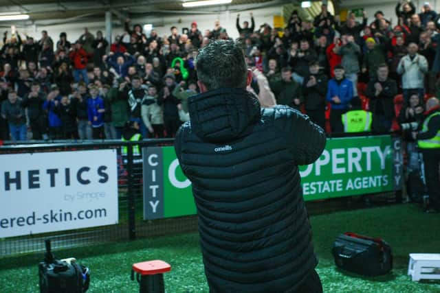 Bohemians manager Declan Devine applauds the travelling support at Brandywell. Photo by Kevin Moore.