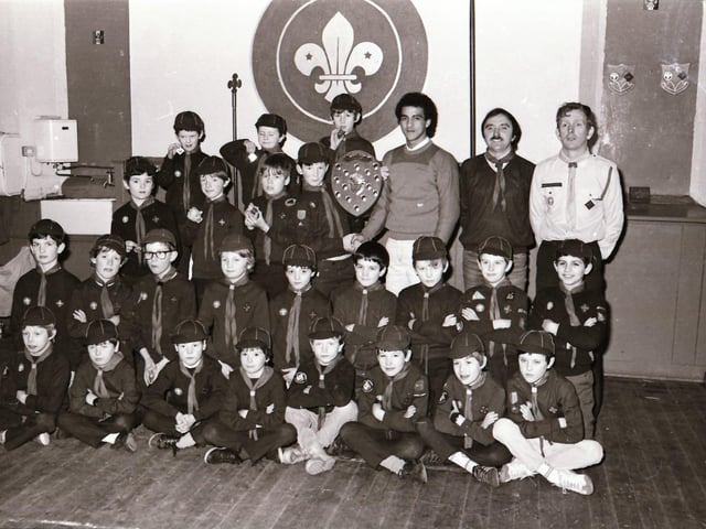 Owen Da Gama presents St Eugene's Cubs with CBSI Football trophy.