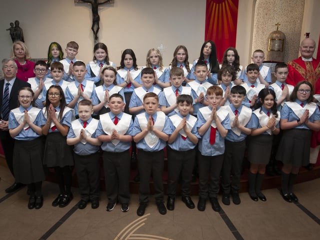 Pupils from Mr. Paul O’Doherty’s class at St. Brigid’s Primary School who received the Sacrament of Confirmation from Fr. John Farren at St. Brigid’s Church, Carnhill on Wednesday afternoon last. Included is Principal Ms. Mary McCallion. (Photo: Jim McCafferty Photography)