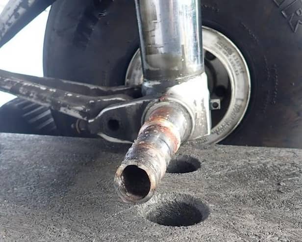 A failure of the wheel axle caused by bearing overheat was identified as the cause of the wheel detachment.