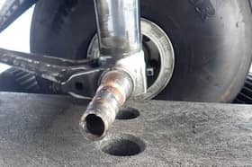 A failure of the wheel axle caused by bearing overheat was identified as the cause of the wheel detachment.