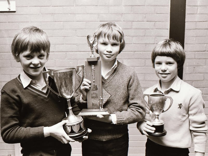 Representatives of winning teams pictured with trophies won by their clubs. From left, John Crossan, Pennyburn Boys (winners Lynch Cup under-11), Ernest Thompson, Rath Celtic (winners D&D Challenge Trophy) and Mark McIntyre, Pennyburn Boys (winner Top Four Trophy under 11), at the D&D annual youth presentations.