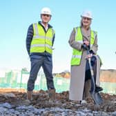 Housing Executive Chief Executive Grainia Long (centre) is joined on-site by Damian Murray (left), from GEDA Construction and Paul Price (right) Director of Housing at the Department for Communities at Sunningdale Gardens in north Belfast, where the first Housing Executive new-build homes in almost 25 years will soon be built. Using ultra-modern methods of construction, the new houses will be built beyond the current building regulations in Northern Ireland. Photo: Simon Graham.