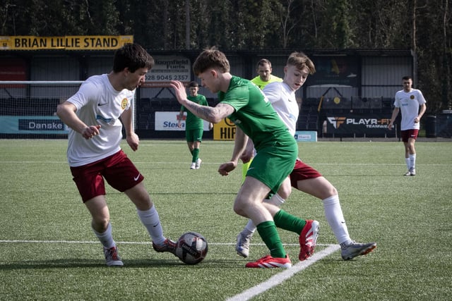 St. Joseph's Callum Deery sidesteps two Dungannon defenders early in the first half of Thursday's Danske Bank u-18 Schools Cup Final.