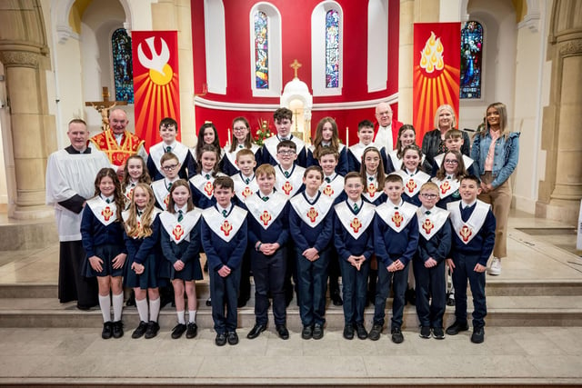 Pupils from Mrs Crumley's Class, St Patrick's Primary School, pictured at their confirmation at St Patrick's Chapel, Pennyburn. Included, are Fr Noel McDermott, Fr Michael McCaughey and Fr Sean O'Donnell. (Stephen Latimer)