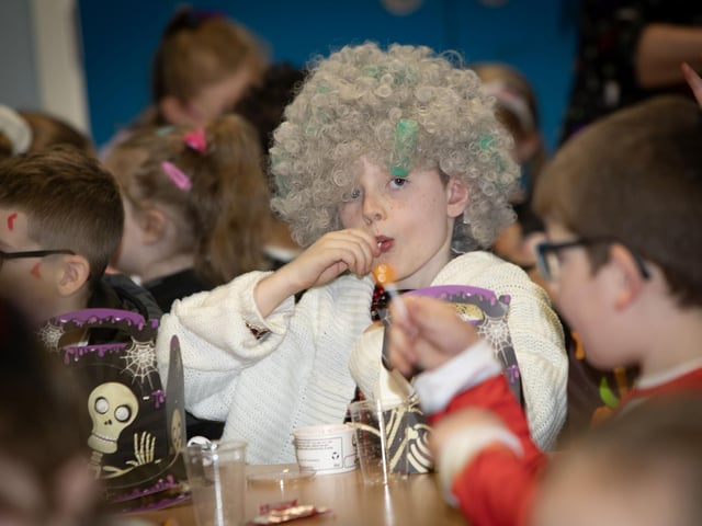 P3 pupil Darragh taking time out from his busy schedule during Friday's Halloween festivies at Greenhaw PS. : .