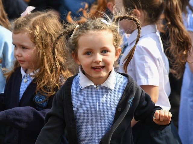 A Rosemount Primary School pupil dancing to the music and song of the Jive Aces on Thursday morning. Photo: George Sweeney