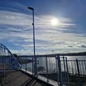 The sun hovering over Derry's new pedestrian bridge at Pennyburn this morning. The new bridge and new riverside stretch of path, which links the wider Derry and Donegal greenway network, opened this week and is already proving very popular with walkers, runners and cyclists.