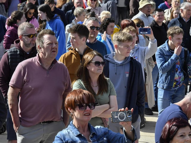 Revellers enjoy the sunshine and the music in Guildhall Square during the Jazz Festival.  Photo: George Sweeney