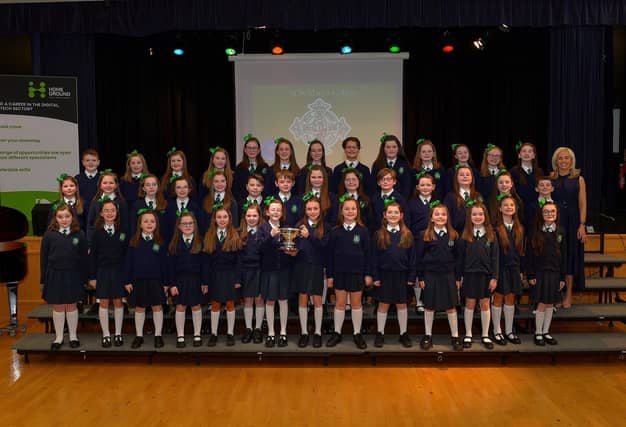 St Patrick’s Primary School choir, winners the Bishop Daly Cup at the Derry Feis Choir Competitions held in St Mary’s College on Tuesday. Included in the photograph is musical director Ursula Cullen. Photo: George Sweeney. DER2314GS – 06