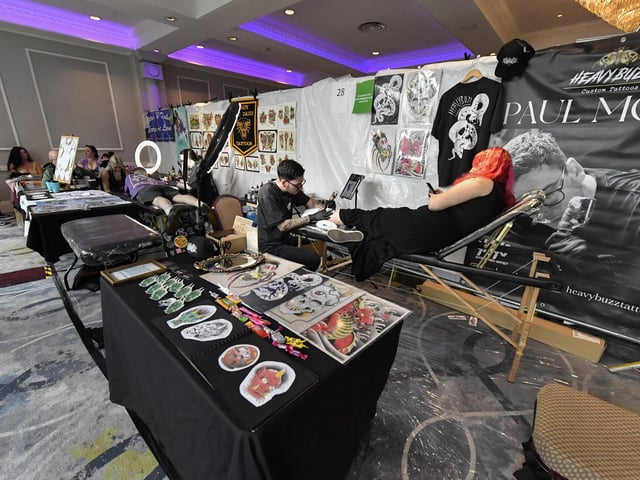 Tattoo artists at the annual Maiden City Ink International Tattoo Convention held in the Everglades Hotel. Photo: George Sweeney