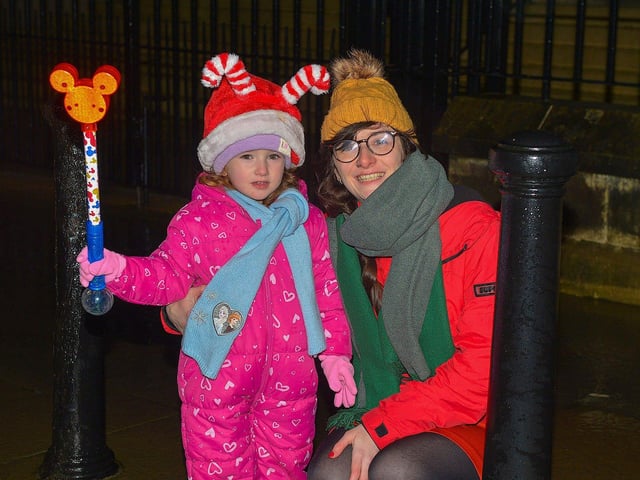 Families pictured at the Derry Christmas procession on Sunday evening last. Photo: George Sweeney. DER2248GS - 21 
