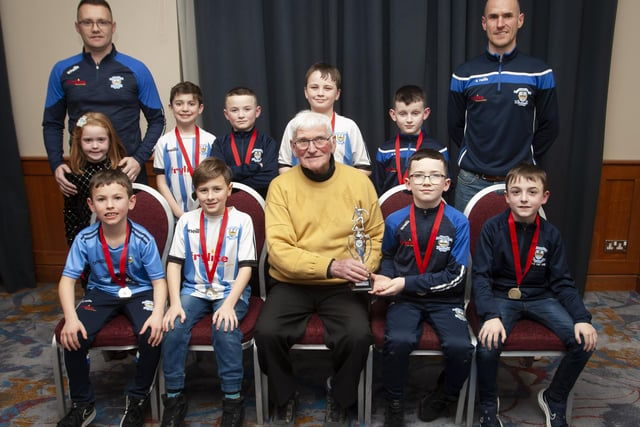 John ‘Jobby’ Crossan presenting the U9 Summer Championship Plate to Strabane Colts at the Annual Awards in the City Hotel on Friday night last. Included are coaches Ryan Coyle and Neil Conroy.