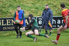 City of Derry's Conor Cummings scores his first try against Ballycastle. Photo: George Sweeney.