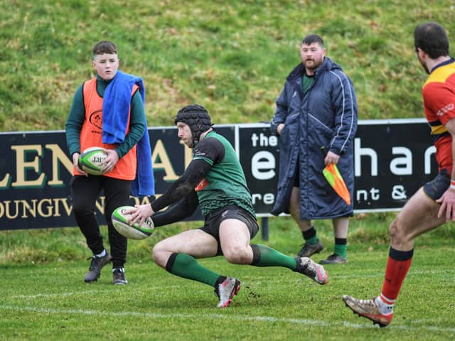 City of Derry's Conor Cummings scores his first try against Ballycastle. Photo: George Sweeney.