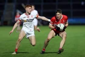 Derry's Ruairi Forbes gets away from Tyrone's Callum Daly during Wednesday's Ulster U20 Football final in Armagh. (Photo: John Merry)