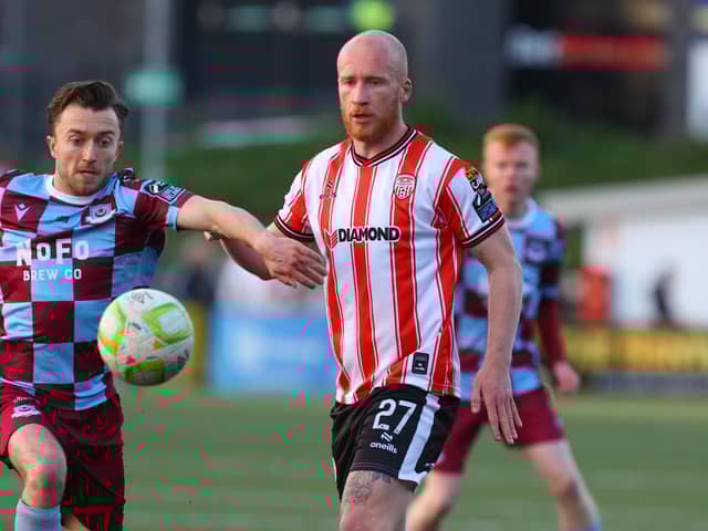 Derry City goalscorer Liam Boyce and Drogheda United's Darragh Markey before the Belfast man got sent off in the second half.
