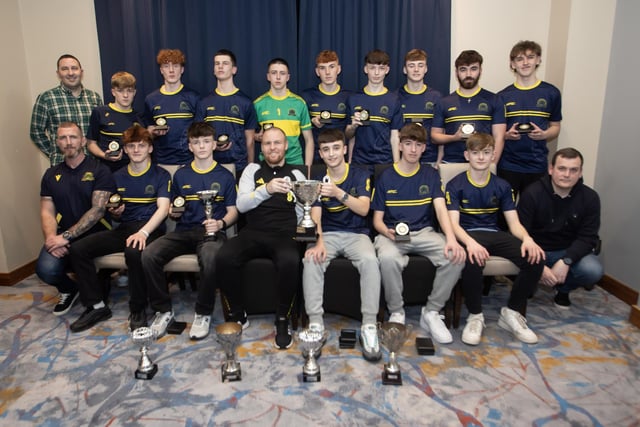 Ronan O'Donnell, Irish Football Association, special guest, presenting Don Boscos u-16s with the League Trophy u-16; League Trophy u-17, Summer Cup u-17; Winter Cup u-17 and Team of the Year trophy at the D&D Youth Awards at the City Hotel on Friday night last. Included are coaches Emmet Kirk, Davy Ferguson and Brian McCay.