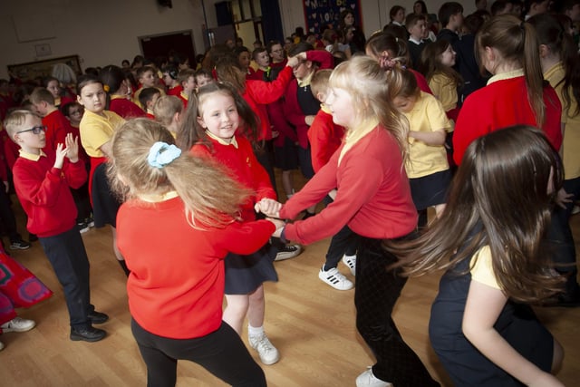 Youngsters from Steelstown PS show off their dancing skills to the Jive Aces.