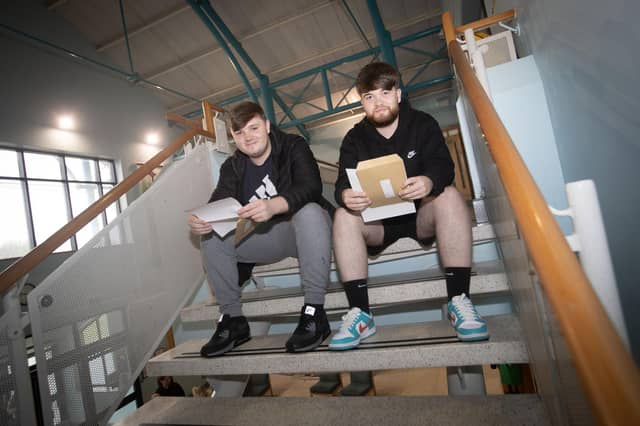 A Level students Nathan Coulter and Daniel Spence checking out their results at St. Joseph's on Thursday morning. (Photos: Jim McCafferty Photography)