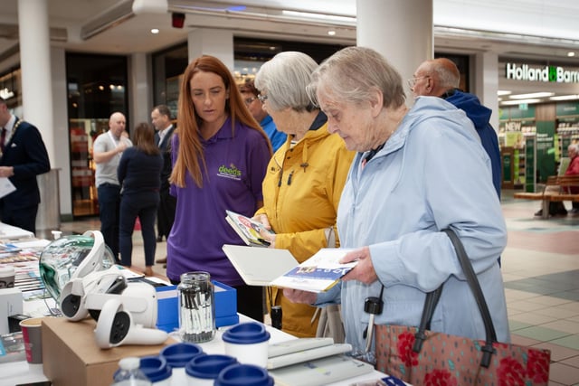 The Old Library Trust's Sabrina Lynch in conversation with Shelagh McMahon and Evelyn Collins during the DEEDS/OLT's 'One Stop Shop' for information on dementia at Foyleside Shopping Centre on Thursday.