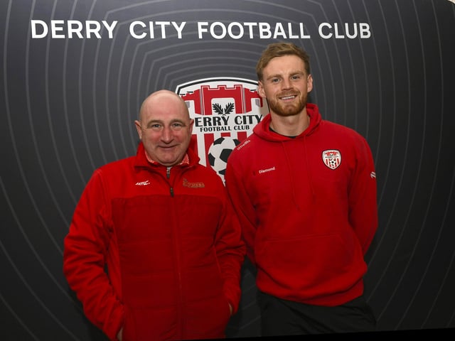 Candystripes fan Keith Burke pictured with Derry City's Rob Slevin at the club's merchandise store in Foyleside Shopping Centre. Photo: George Sweeney