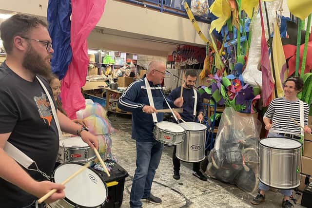 The NW Carnival Samba band practice their moves for their debut performance at this year's parade