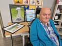David McFaul pictured with some of his paintings at Glenoaks Day Centre.