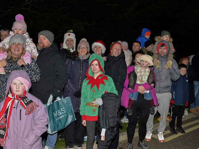 Families gather for the Elf Parade at the Community Hub on Friday night. Photo: George Sweeney