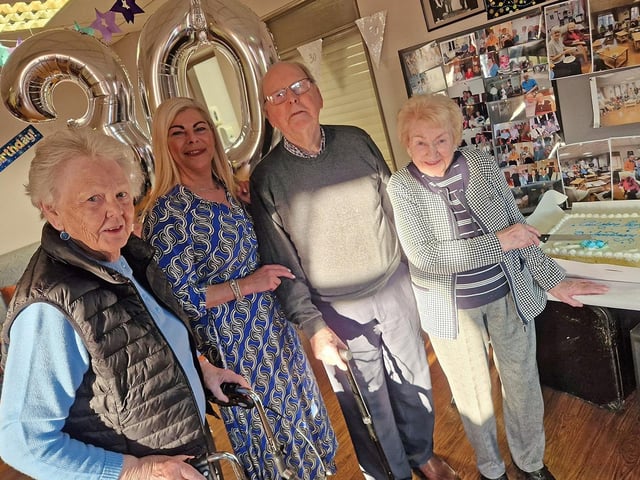 Cutting the cake L-R: Nuala Doak, Julie Montgomery, Conal McHugh and Mary McDowell.
