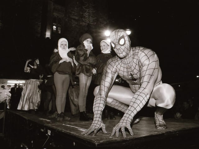 Crowds watch as Mayor and Mayoress of Derry, John and Carita Kerr switch on the Christmas lights with a little help from Spider Man and the Power Rangers.