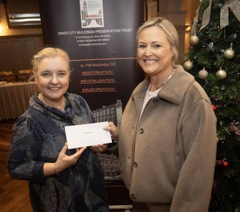Lisa Bradley, Inner City Trust, pictured handing over a cheque to Noella O'Neill, Samaritans, at the Bishop's Gate Hotel, Derry on Thursday afternoon last. The event was part of the Inner City Trust's Annual Charity Giving. (Photos: Jim McCafferty Photography)