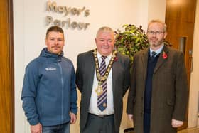 Philip Mullan pictured with the Mayor of Causeway Coast and Glens Borough Council, Councillor Ivor Wallace and Councillor James Mc Corkell