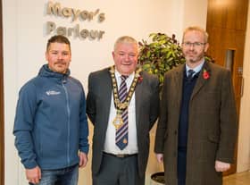Philip Mullan pictured with the Mayor of Causeway Coast and Glens Borough Council, Councillor Ivor Wallace and Councillor James Mc Corkell