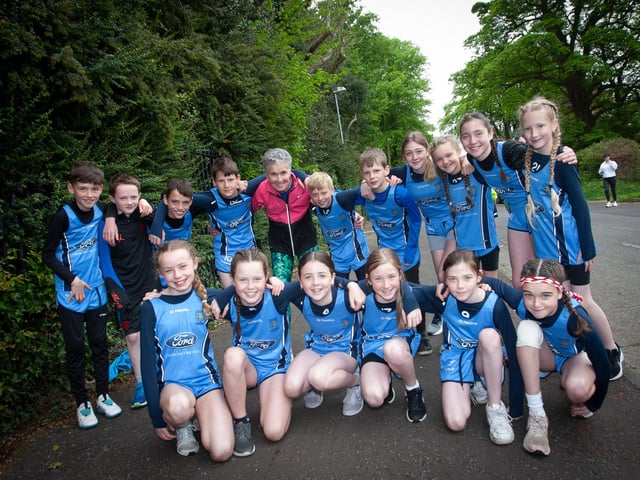 The legend that is Roisin Lynch pictured with the Hollybush Cross Country team on Friday. (Photos: jim McCafferty Photography)