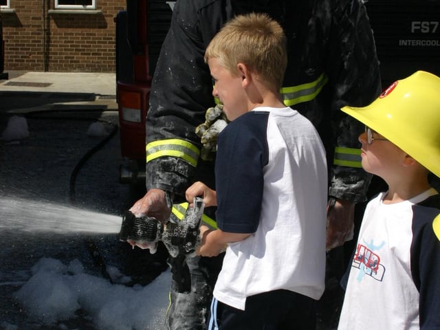 Getting a go on the fire hose.