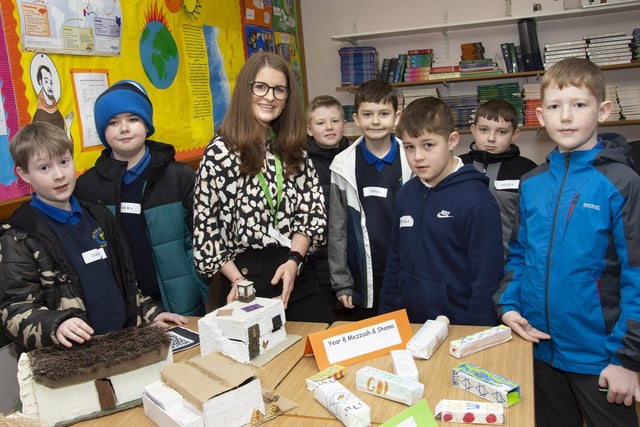 Mrs. Lagan, Head of RE, pictured with some prospective pupils on Friday.