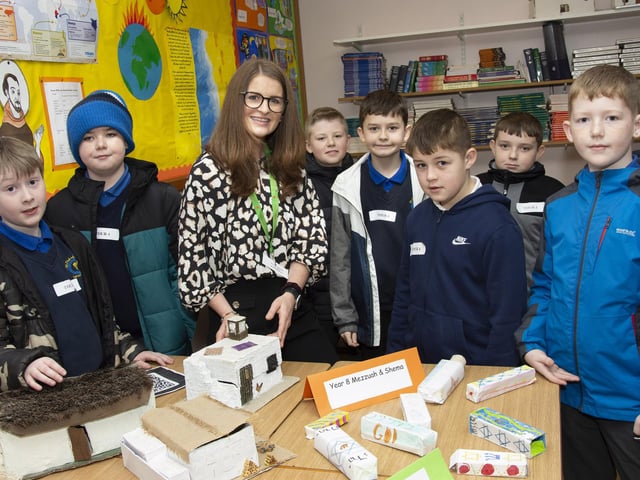 Mrs. Lagan, Head of RE, pictured with some prospective pupils on Friday.