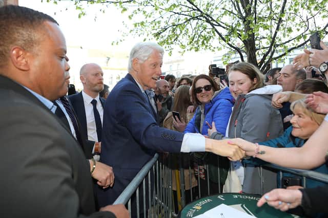 Bill Clinton greeting members of the public during his visit to Derry.