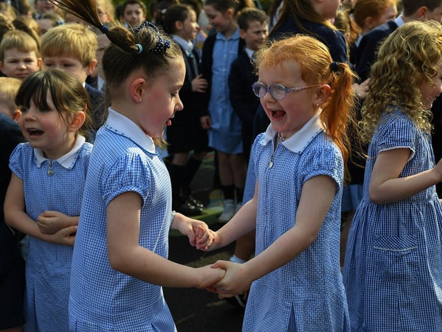 Children at Rosemount Primary School dance to the music and song of the Jive Aces on Thursday morning. Photo: George Sweeney