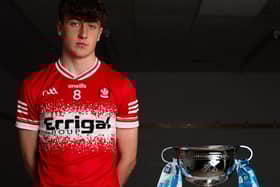 Derry minor captain James Sargent with the Ulster Minor Championship trophy.