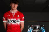 Derry minor captain James Sargent with the Ulster Minor Championship trophy.