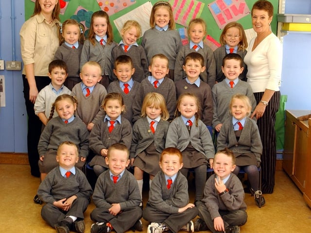 Pupils from St Brigid's PS pictured with teacher, Miss Cora Hassan, and classroom assistant, Mrs Carole Pyke. (0310A08):20 years on: Young people across Derry and Donegal starting school in September 2003